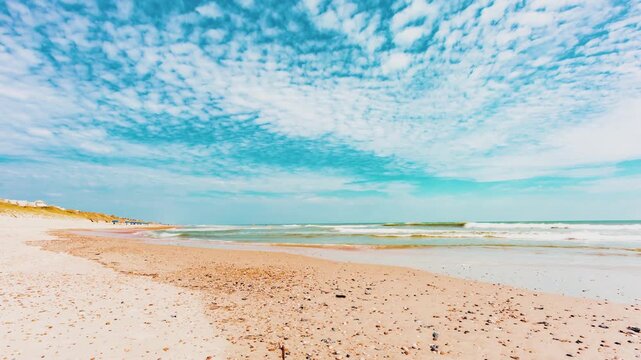 East Coast Usa Beach Timelapse Capturing Rhythmic Ocean Waves and Rolling Cirrocumulus Clouds Above a Serene Sandy Shoreline with Gentle Tides in 4k Resolution