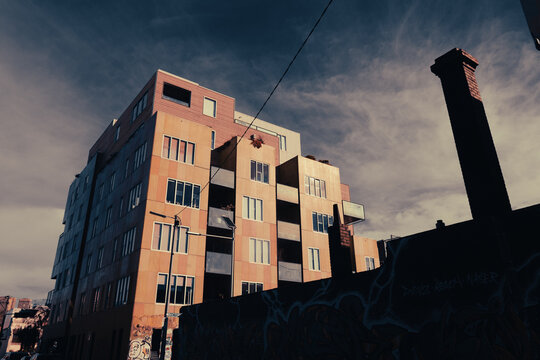 Modern architecture building with colorful facade and graffiti wall in Fitzroy Melbourne Australia on a clear day