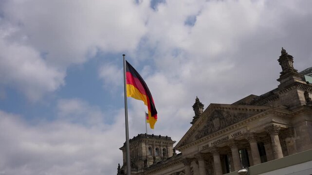 German Flag Flying Above the Reichstag Building in Berlin