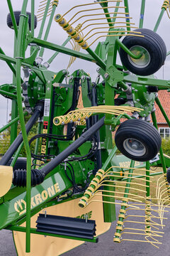 New Krone hay windrower at dealer exhibition in Brons Denmark modern farming mechanisation equipment for agriculture machinery harvest field