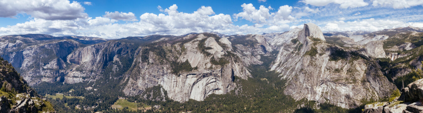 Panoramic Yosemite National Park Valley with Granite Cliffs and Clouds
