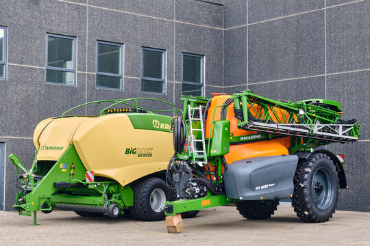 Agricultural mechanization equipment Krone Big Pack bale press and Amazone crop sprayer in Brons Denmark agriculture farming machinery baler