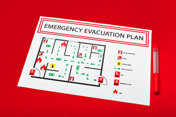 Plakat Emergency evacuation plan outline showing routes and exits for safety during emergency situations