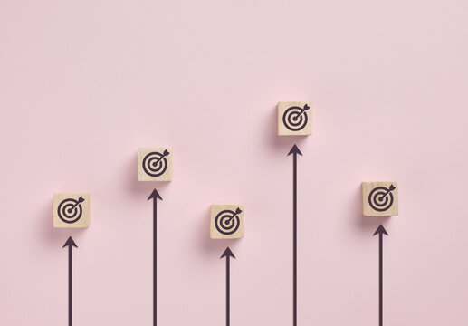 Business goals arrows pointing to growth success