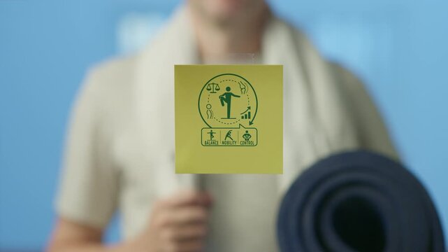 Yoga teacher holding a mat and a towel presents a card with icons symbolizing balance, mobility, and body control, illustrating key concepts for functional training and physical well being