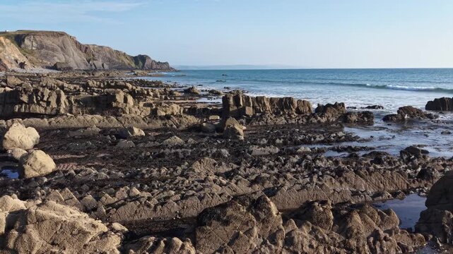 Sunny evening on a Rocky Cornish beach in July