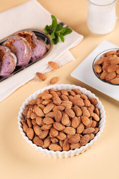 Shelled Almonds in Bowl with Protein Meal - Healthy Snack Food Preparation