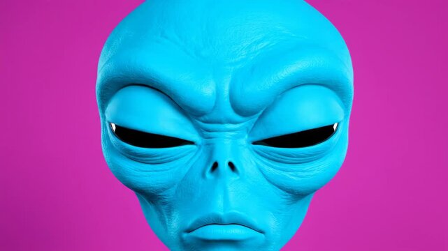 Cyan Blue Alien Head Blinking Large Glossy Black Eyes Against Solid Pink Background