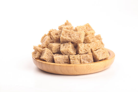 Dried Tofu Cubes in Wooden Bowl - Asian Protein Food Ingredient on White Background