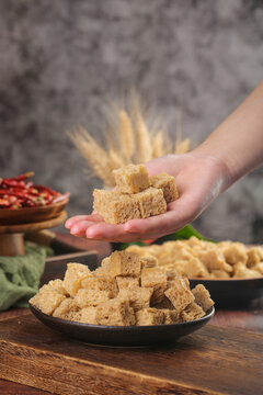 Traditional Handmade Honeycomb Candy with Wheat and Spices on Rustic Wooden Table