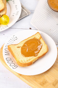 Toast with Golden Orange Sauce on Good Morning Plate - Breakfast Food Photography