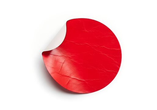 A red circular object with a bite taken out of it