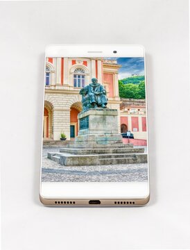 Smartphone Displaying Bernardino Telesio Statue in Cosenza, Italy