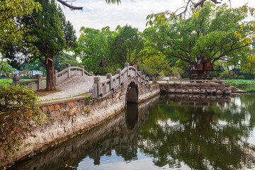 Fototapeta premium Historic Stone Arch Bridge at Liyuan Garden, Wuxi, Jiangsu Province