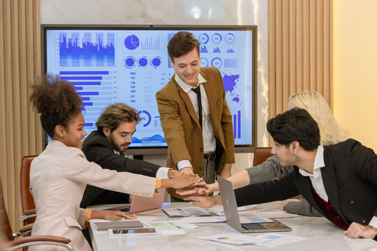 Diverse colleagues gather in brainstorm discuss statistics together. Group of people colleagues gather doing Brainstorming business plan together. Team Brainstorm Working Concept.