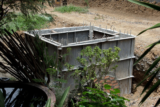 Steel formwork for constructing concrete foundations for drainage pipes.