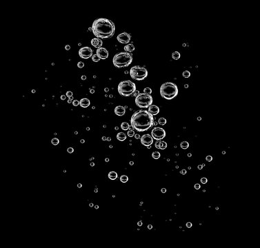 white water bubble liquid abstract, oxygen air underwater isolated on a black background. bubble in water