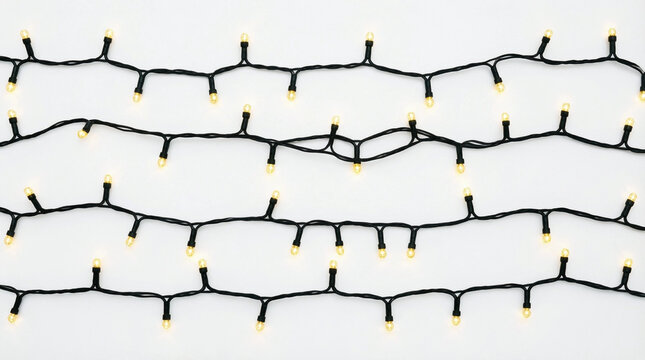 String of warm white Christmas lights on plain background, ideal for festive decoration or holiday-themed design projects