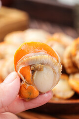 Fresh Shucked Scallop from Qingdao China - Raw Seafood Without Sand on Ice © DangThi