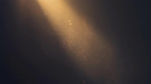 Soft warm light beam illuminating floating dust particles in dark atmospheric space
