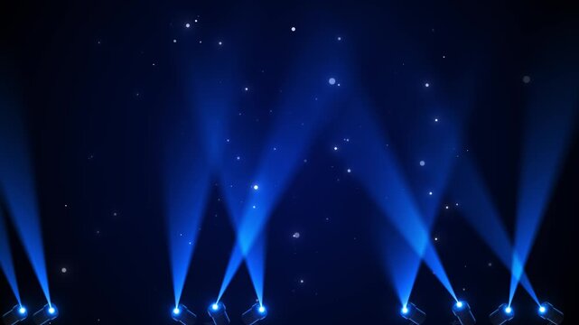 Blue stage spotlight background bright beams, glowing floor lamps, and tiny star particles scene. concert , award intros, theater promos, performance reels, event titles, cinematic motion overlays.
