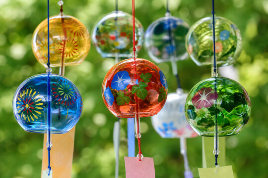 Colorful glass wind chimes cluster close-up summer refreshing Japanese