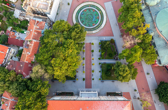 Aerial Top-Down View of a Beautiful City Square with a Fountain