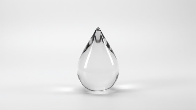 Transparent Teardrop Glass Paperweight Isolated on White Background