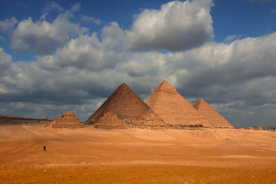 Sphinx and Giza Pyramids on a cloudy day - Cairo, Egypt
