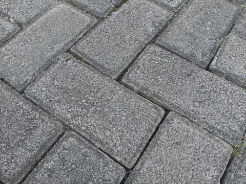 Rectangular paving stone flooring background; suitable for use as wallpaper.