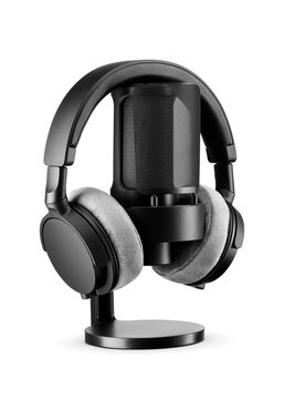 Studio microphone and over-ear headphones for podcasting, voiceover, and sound production isolated. Transparent PNG image.