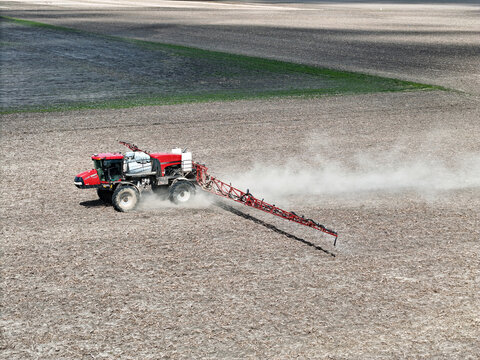 Poplar Grove, Illinois May 6, 2026 Case IH Patriot 4440 self-propelled field sprayer applying herbicide to a farm field.
