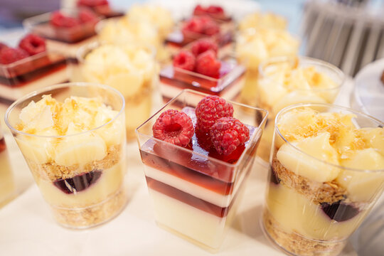 Candy bar with diverse sweets and desserts at a wedding party, elegant dessert table arrangement for luxury event celebration