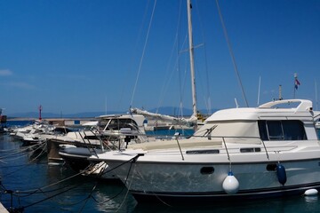 Fototapeta premium Yachts Moored At Coastal Marina Pier