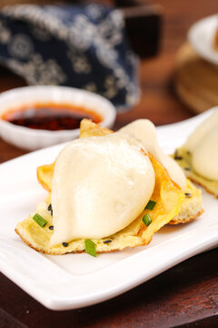 Fresh Chinese Steamed Buns with Meat Filling and Soy Dipping Sauce - Traditional Shandong Delicacy