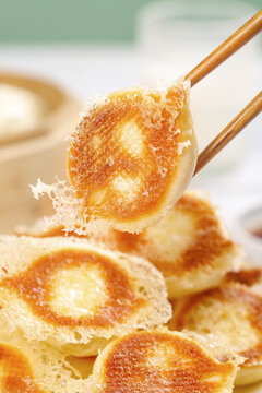 Shandong Pan-Fried Buns with Chopsticks - Golden Crispy Chinese Dumplings Delicacy