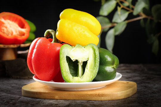 Fresh Shandong Bell Peppers - Colorful Red Yellow Green Vegetables on Wooden Board