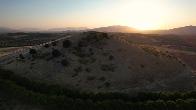 Aerial view of Lydian Tumuli of Bin Tepe at sunset, Turkiye.