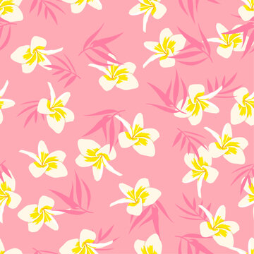 Seamless tropical floral pattern white and yellow plumeria flowers, pink tropical leaves background. Decorative botanical repeat print for fabric, textile, wallpaper, wrapping paper, summer design