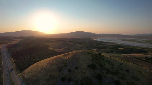 Aerial view of Lydian Tumuli of Bin Tepe at sunset, Turkiye.