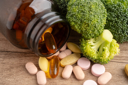 Drug with broccoli vegetable for healthy food.