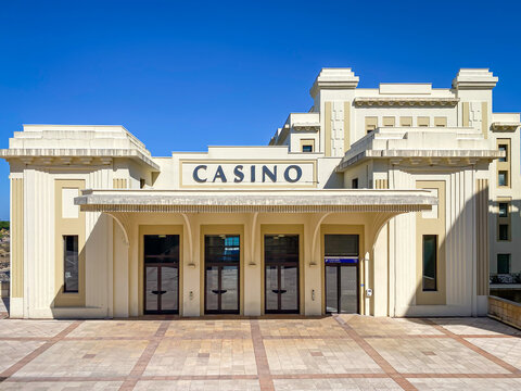 Art Deco entrance and plaza of the historic Casino Municipal located along the seafront promenade in Biarritz, France