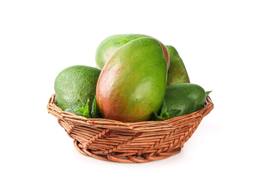 Fresh Green Kate Mangoes and Limes in Wicker Basket from Panzhihua Sichuan China
