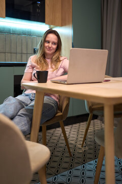 Focused woman managing time and tasks during remote work