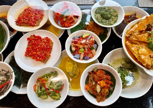 Spicy Minang dishes with curry, rendang, and chili sauce gourmet