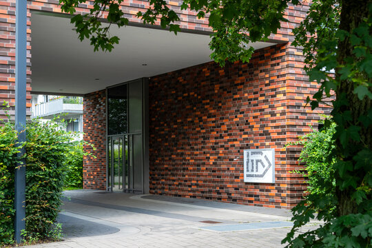 Entrance to a modern apartment building in summer