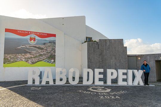 Rabo de Peixe, parish on the island of S&atilde;o Miguel in the Azores, white European man together with the letters of the locality.