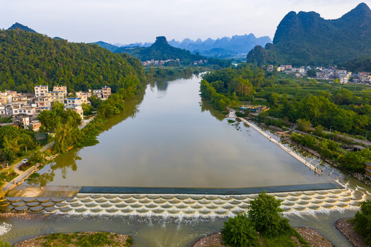 Aerial view of river weir and karst mountains in Lipu, Guangxi, China
