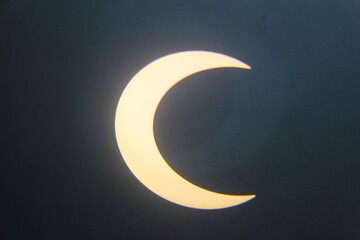 Glowing Crescent Moon on Dark Background © LamQuang