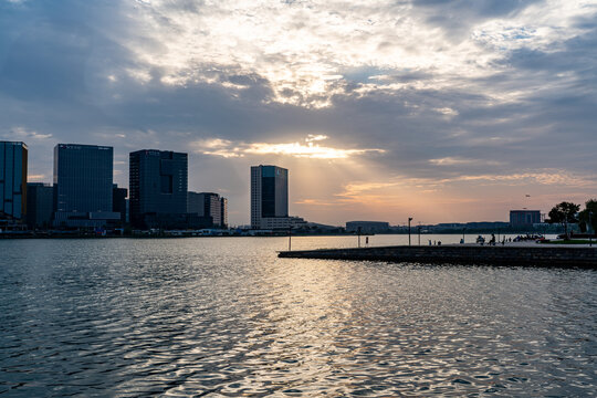 Waterfront City Skyline at Sunset